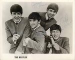 Autographed portrait by all four Beatles